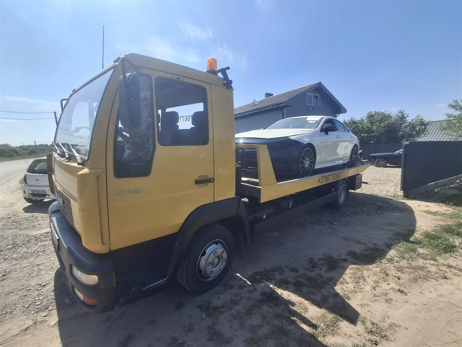 Tralo paslaugos Vilniuje – automobilio pervežimas